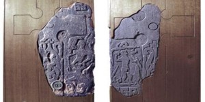 Thorwald’s Cross. The left side depicts Norse god Odin battling Fenrir at Ragnarok; the right has Christian iconography (BBC 2018).
