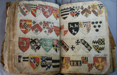 Figure 1: A heraldic manuscript from the YAS archives on display at Leeds City Museum  (Image Copyright: Yorkshire Archaeological Society)