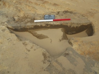 Figure 4. Wind-blown sand rapidly filling an excavated feature (image copyright by author).